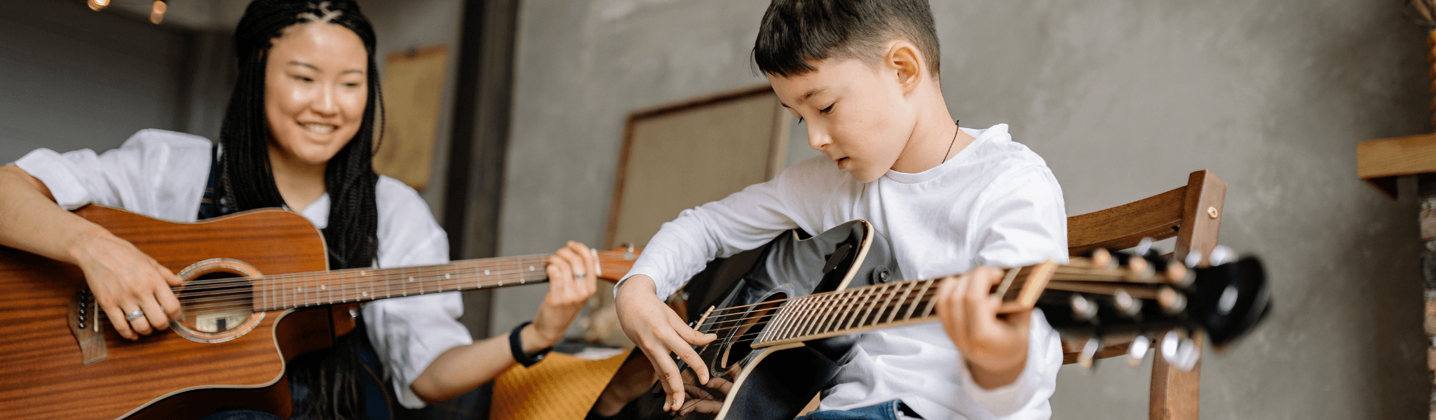 Guitar Lessons For Your Kids Near St Kilda hero background